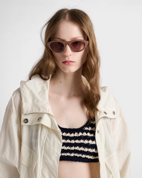 Prada sunglasses with the iconic metal plaque - Mud Brown lenses Prada sunglasses with the iconic metal plaque - Mud Brown lenses