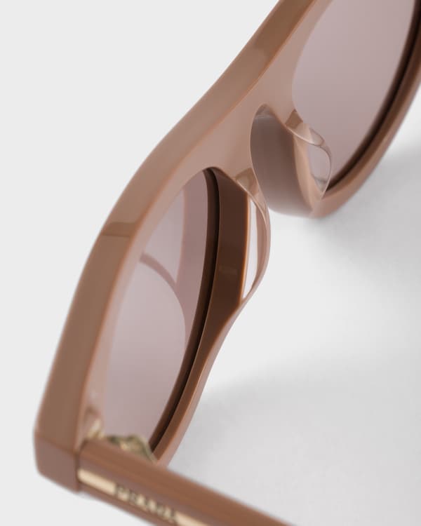 Prada sunglasses with the iconic metal plaque - Mud Brown lenses Prada sunglasses with the iconic metal plaque - Mud Brown lenses