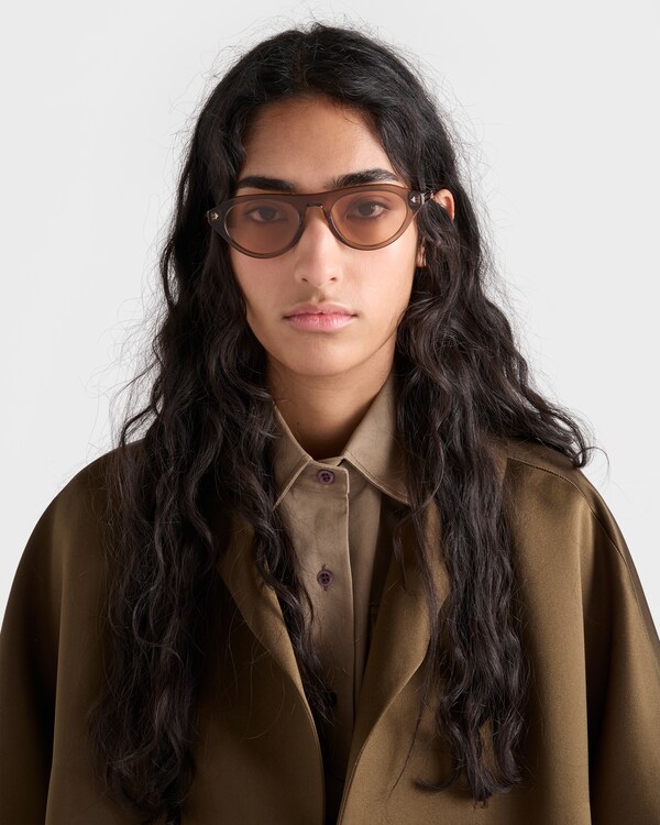 Prada sunglasses with iconic metal plaque - Crystal lenses Prada sunglasses with iconic metal plaque - Crystal lenses