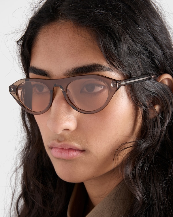 Prada sunglasses with iconic metal plaque - Crystal lenses Prada sunglasses with iconic metal plaque - Crystal lenses