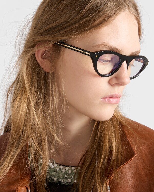 Prada sunglasses with the iconic metal plaque - Crystal lenses Prada sunglasses with the iconic metal plaque - Crystal lenses