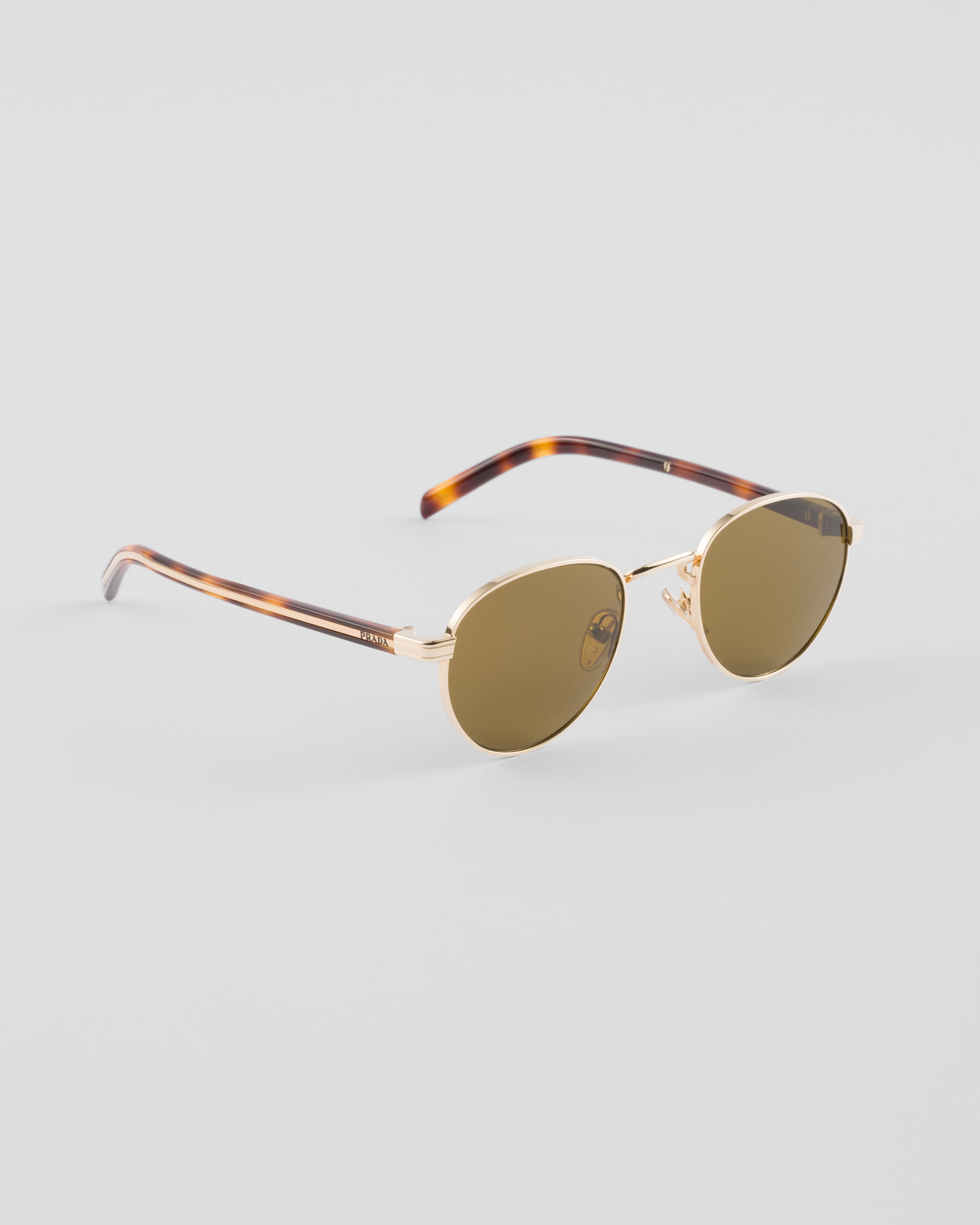 Prada Sunglasses With The Iconic Metal Plaque In Loden Green Lenses