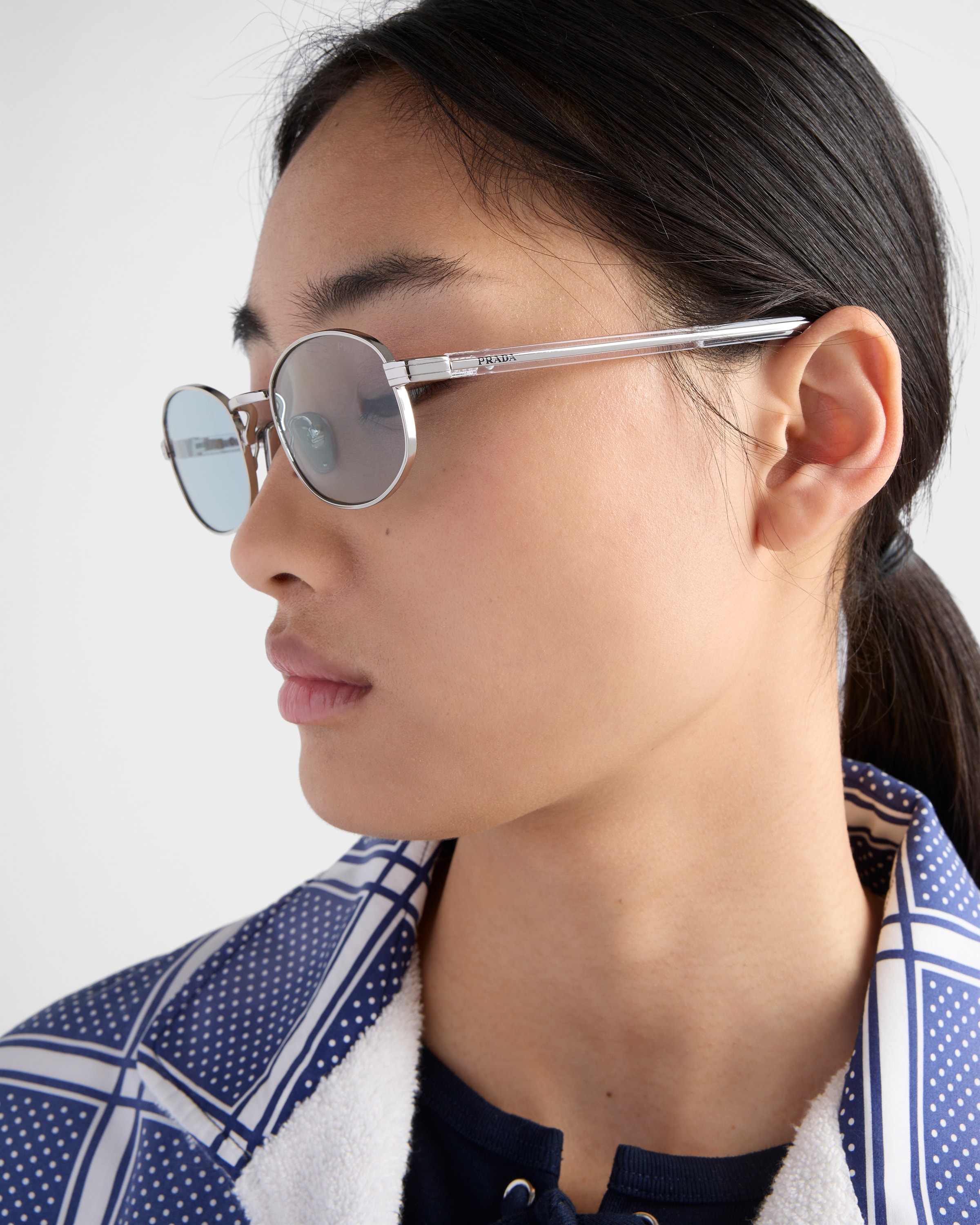Aviator Blue lenses Sunglasses with the iconic metal plaque