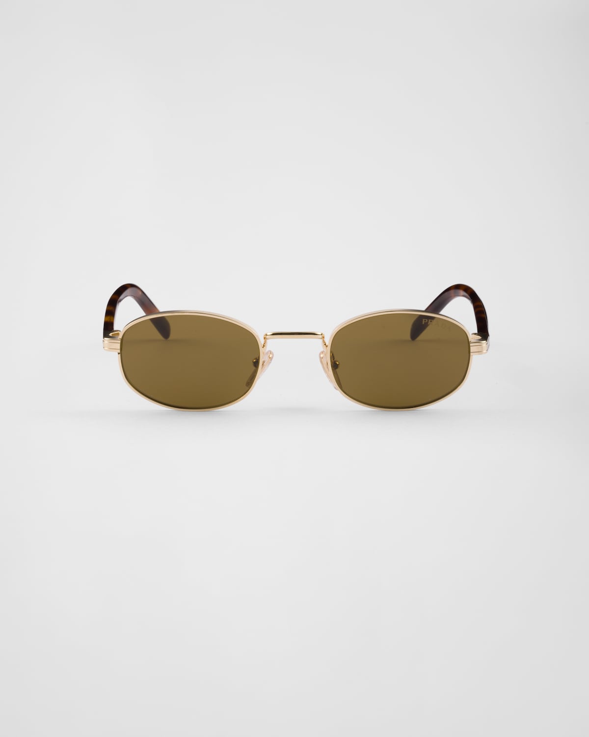 Sunglasses with the iconic metal plaque