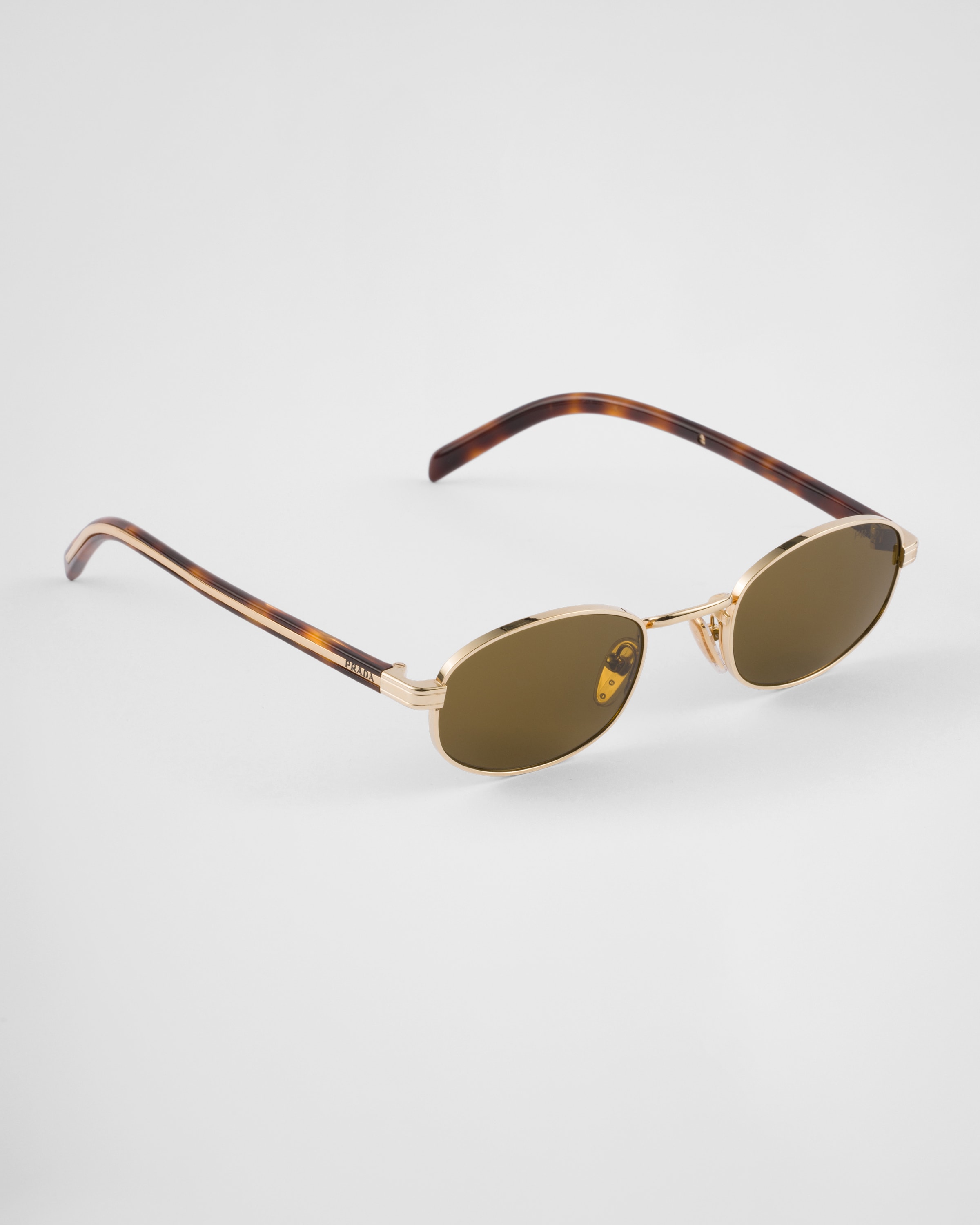 Prada Sunglasses With The Iconic Metal Plaque In Loden Green Lenses