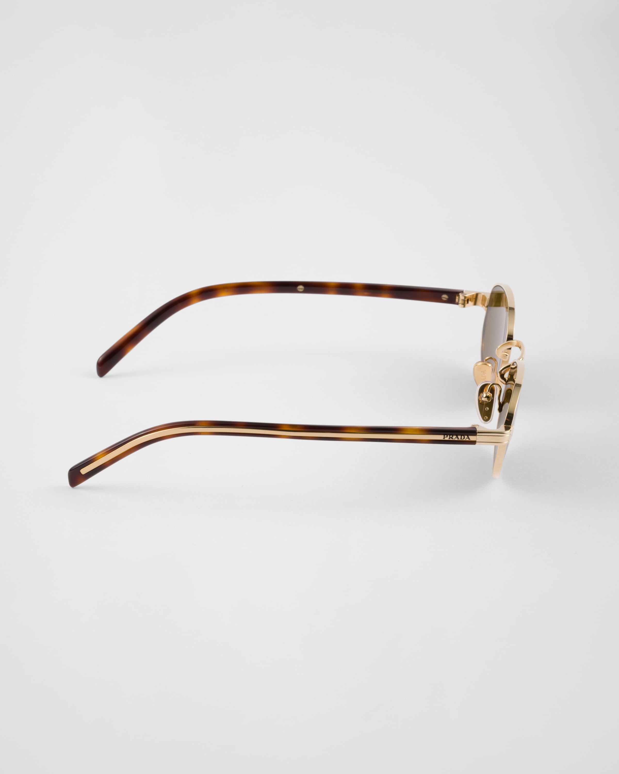 Prada Sunglasses With The Iconic Metal Plaque In Loden Green Lenses