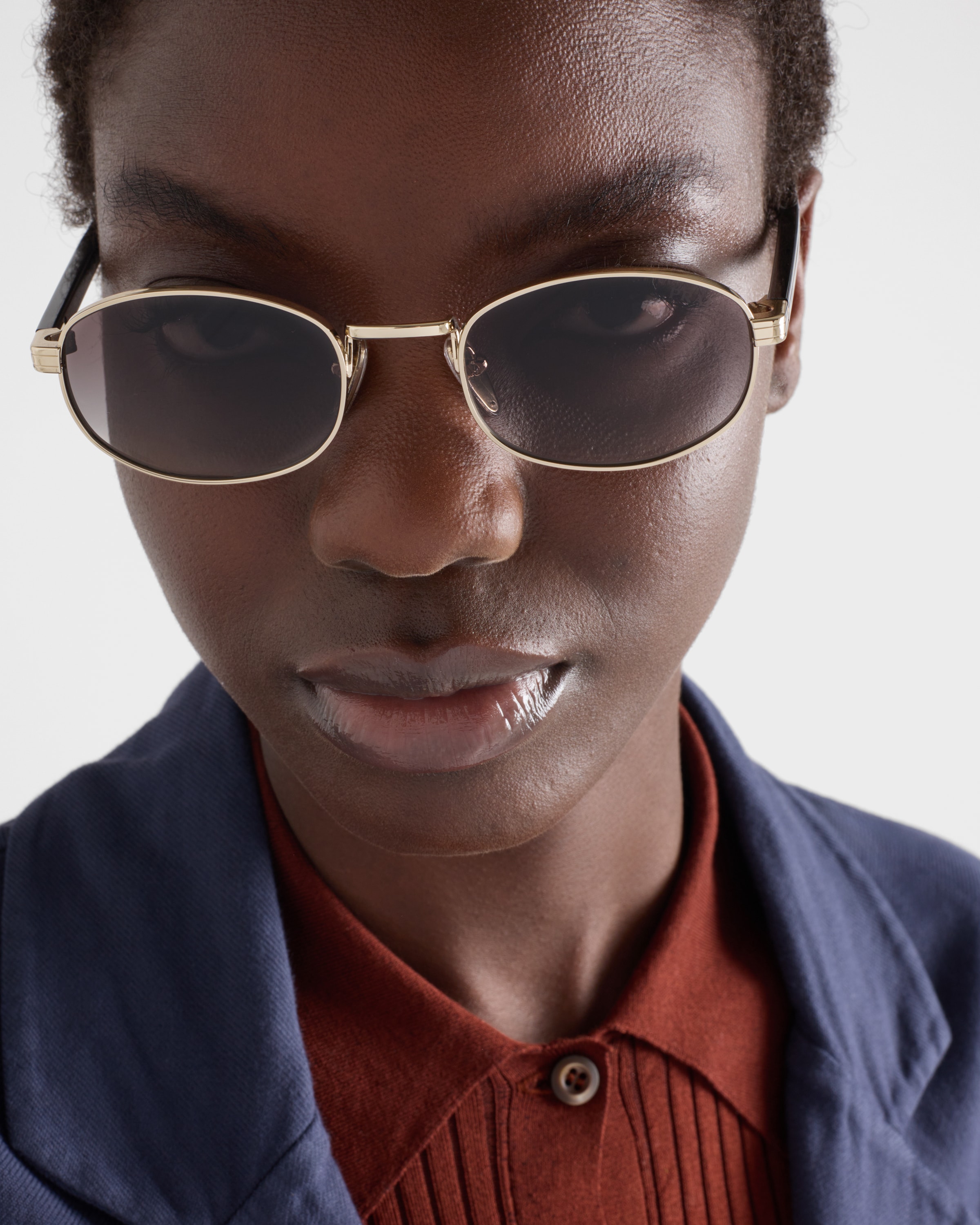 Slate Gray Lenses Sunglasses with the iconic metal plaque