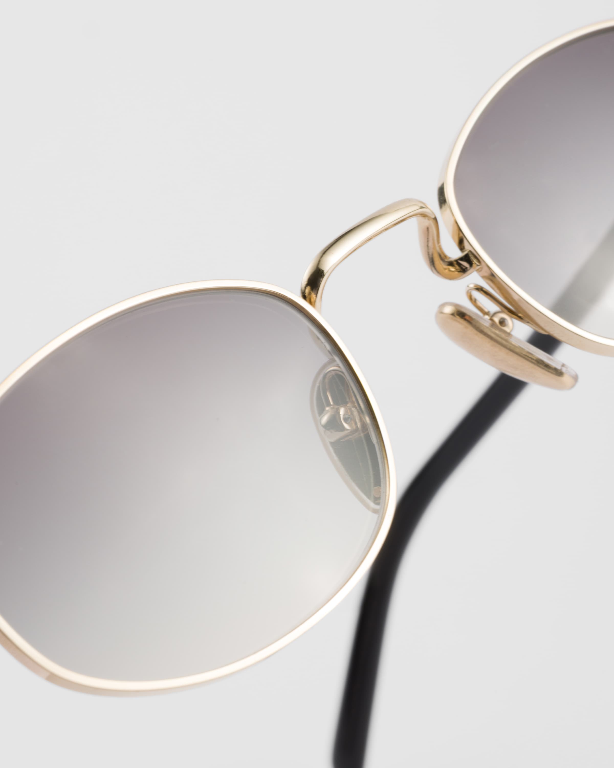 Prada Sunglasses With The Iconic Metal Plaque In Slate Gray Lenses