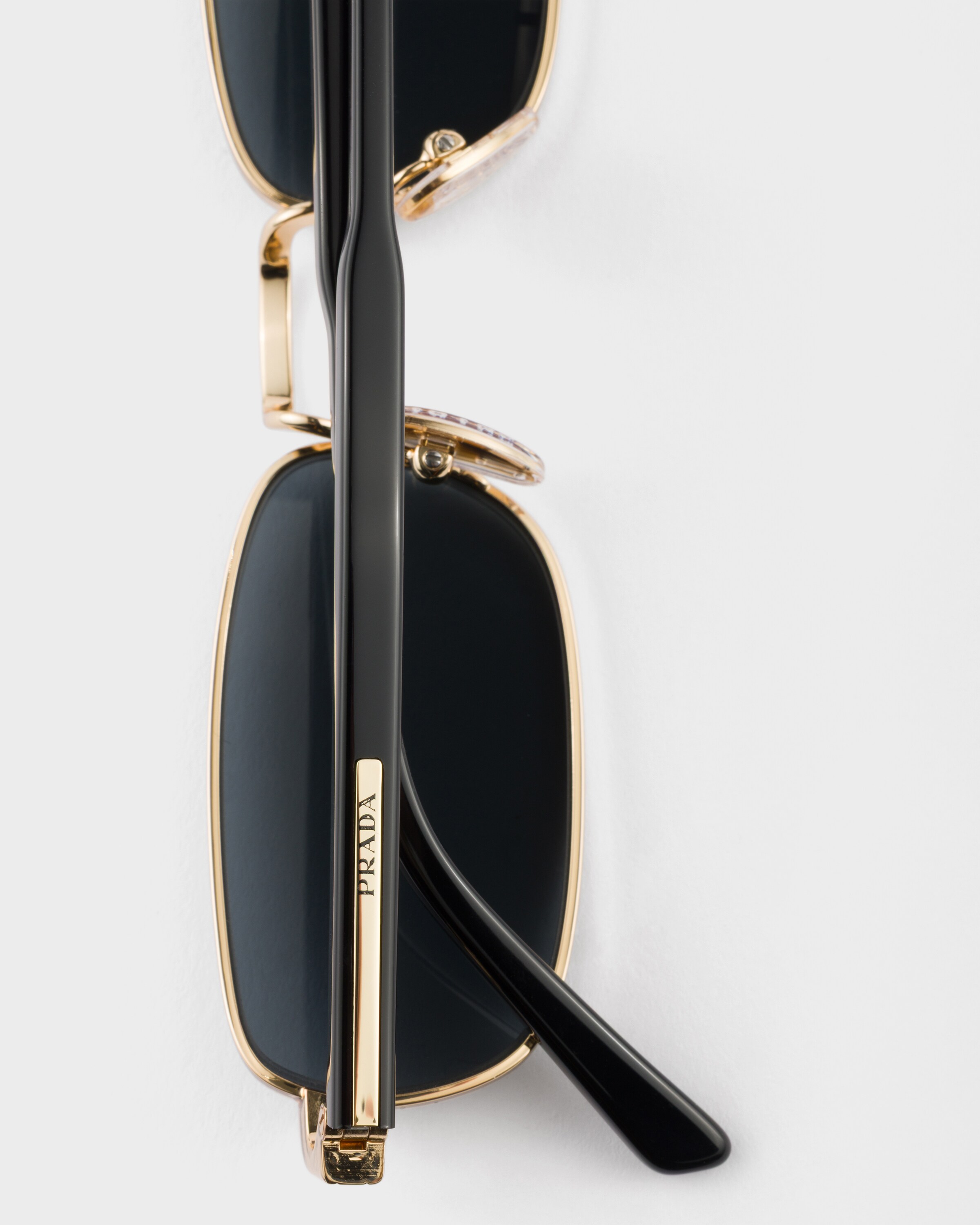 Graphite lenses Sunglasses with the iconic metal plaque | PRADA