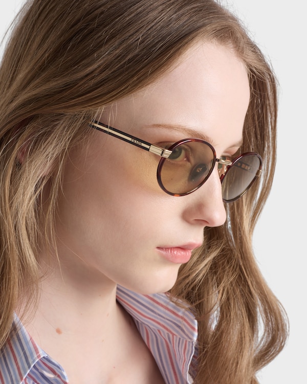 Prada sunglasses with the iconic metal plaque Prada sunglasses with the iconic metal plaque