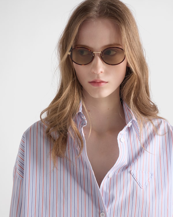 Prada sunglasses with the iconic metal plaque Prada sunglasses with the iconic metal plaque
