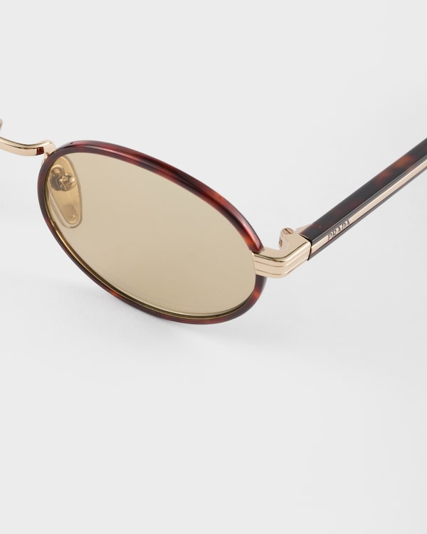 Prada sunglasses with the iconic metal plaque Prada sunglasses with the iconic metal plaque