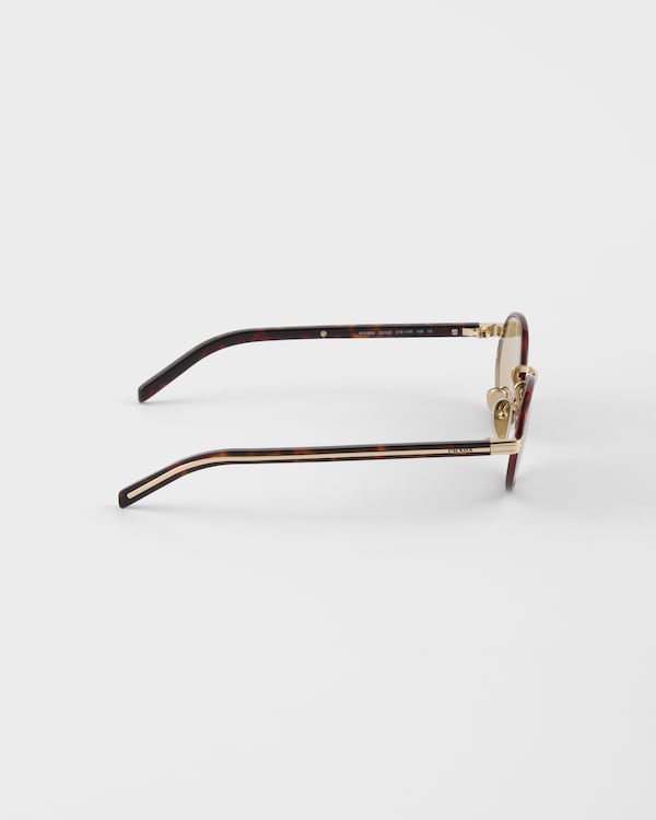 Prada sunglasses with the iconic metal plaque Prada sunglasses with the iconic metal plaque