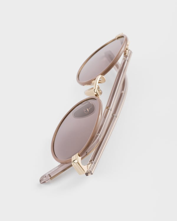 Prada sunglasses with the iconic metal plaque Prada sunglasses with the iconic metal plaque
