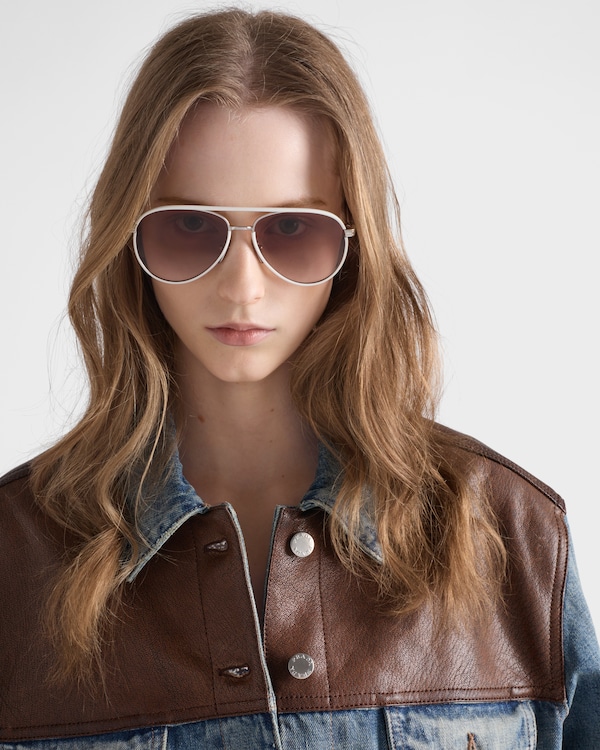 Prada sunglasses with the iconic metal plaque Prada sunglasses with the iconic metal plaque