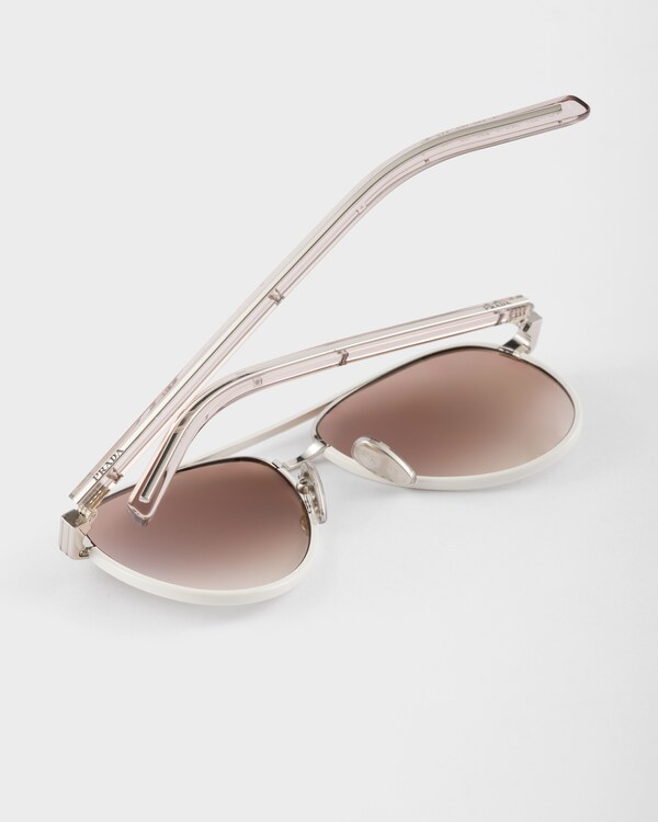 Prada sunglasses with the iconic metal plaque Prada sunglasses with the iconic metal plaque