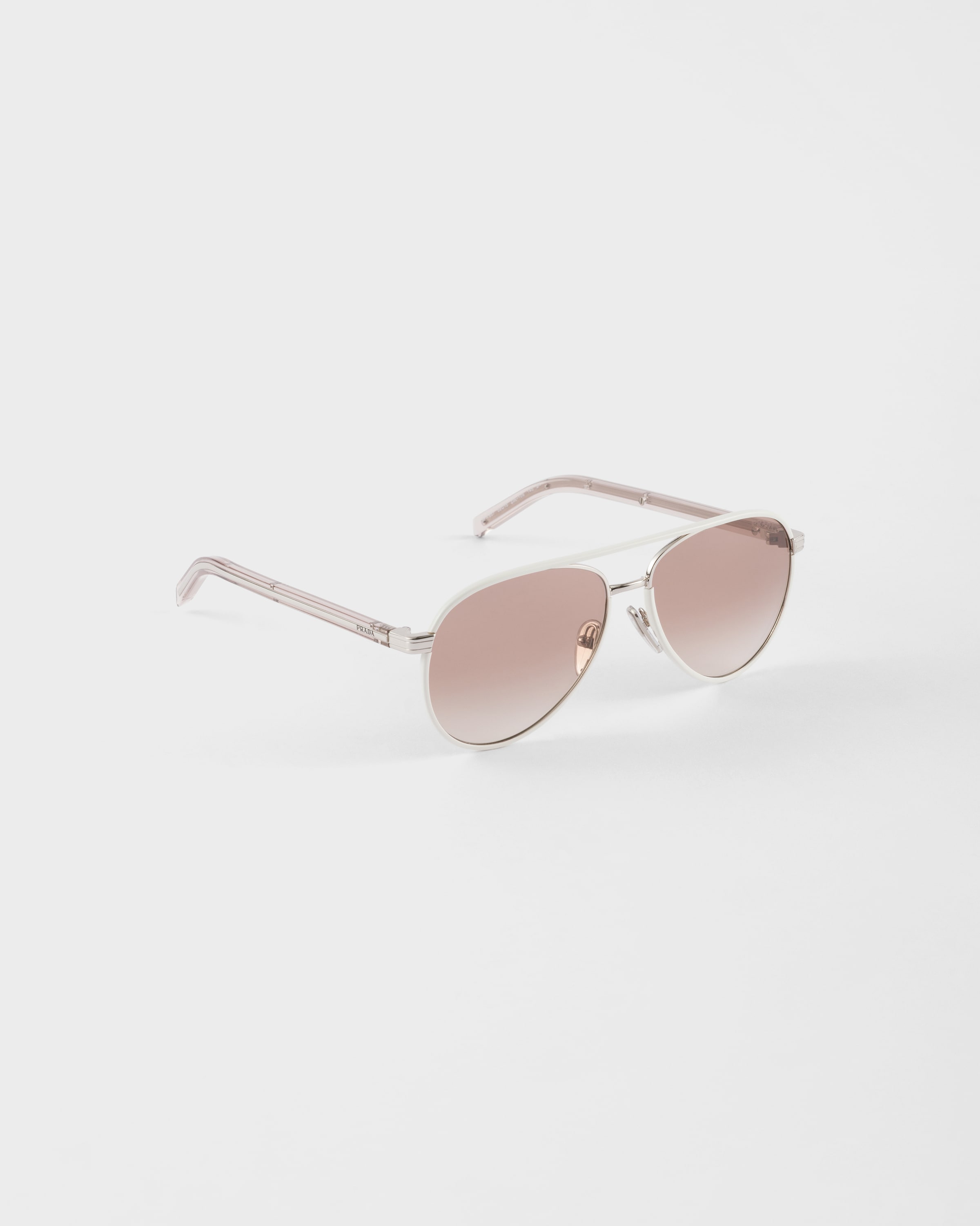 PRADA PRADA SUNGLASSES WITH THE ICONIC METAL PLAQUE