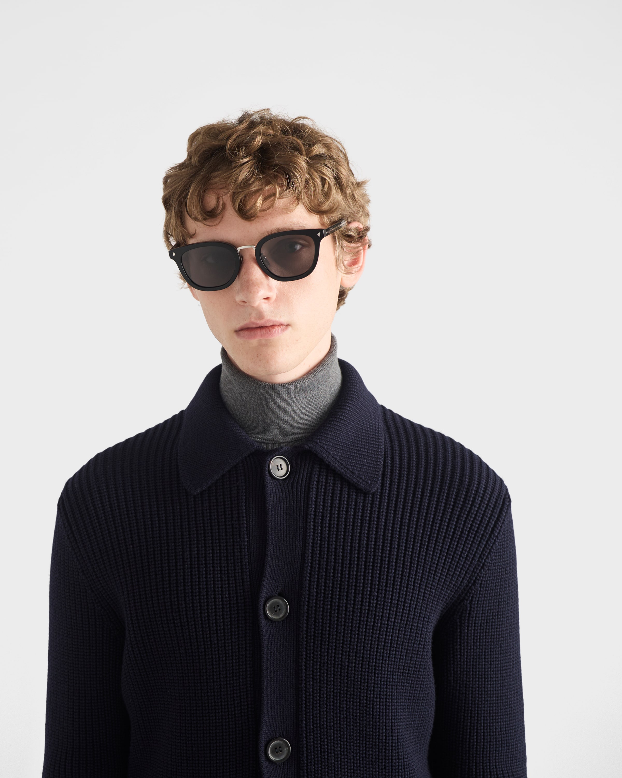 Sunglasses with the iconic metal plaque