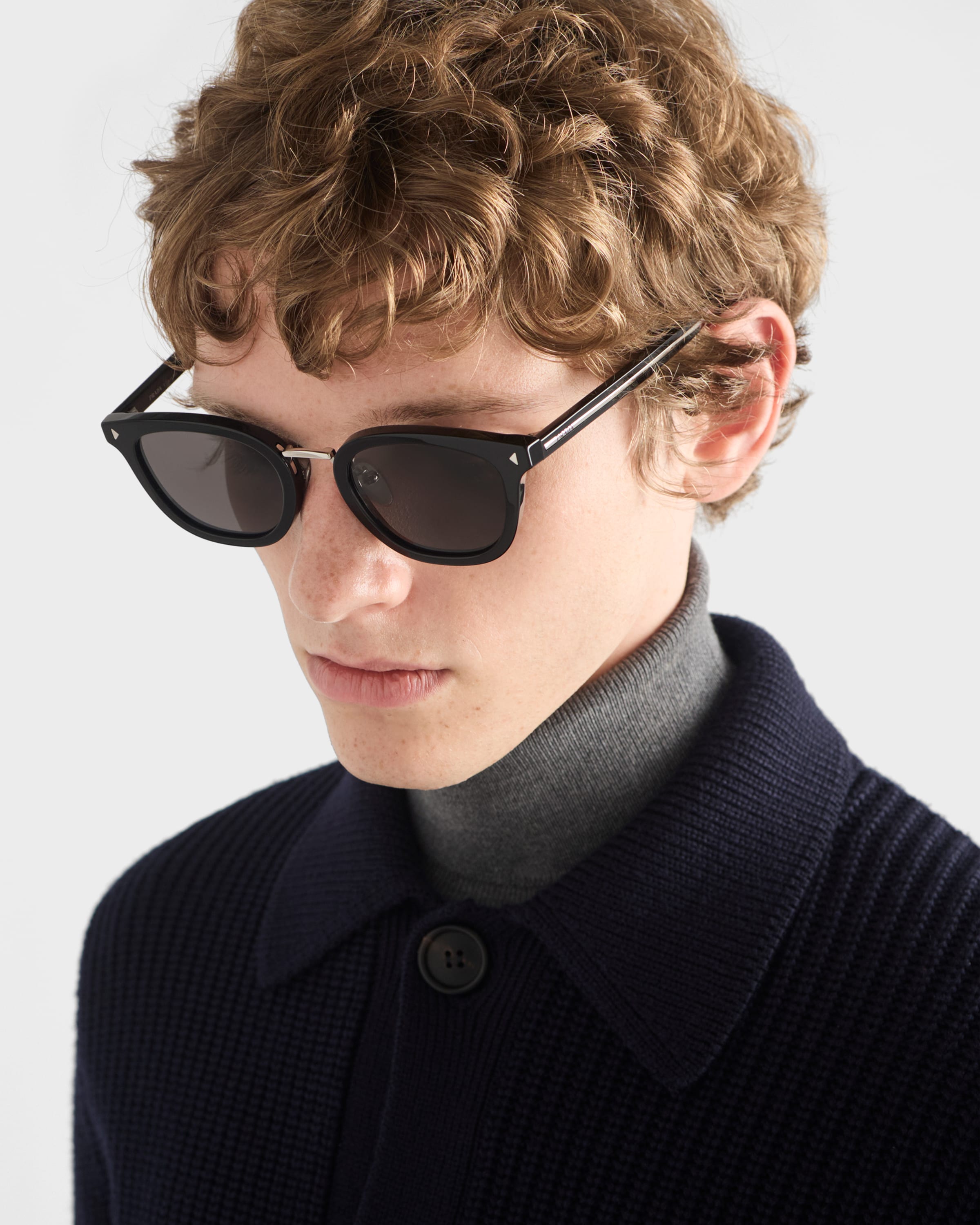 Sunglasses with the iconic metal plaque