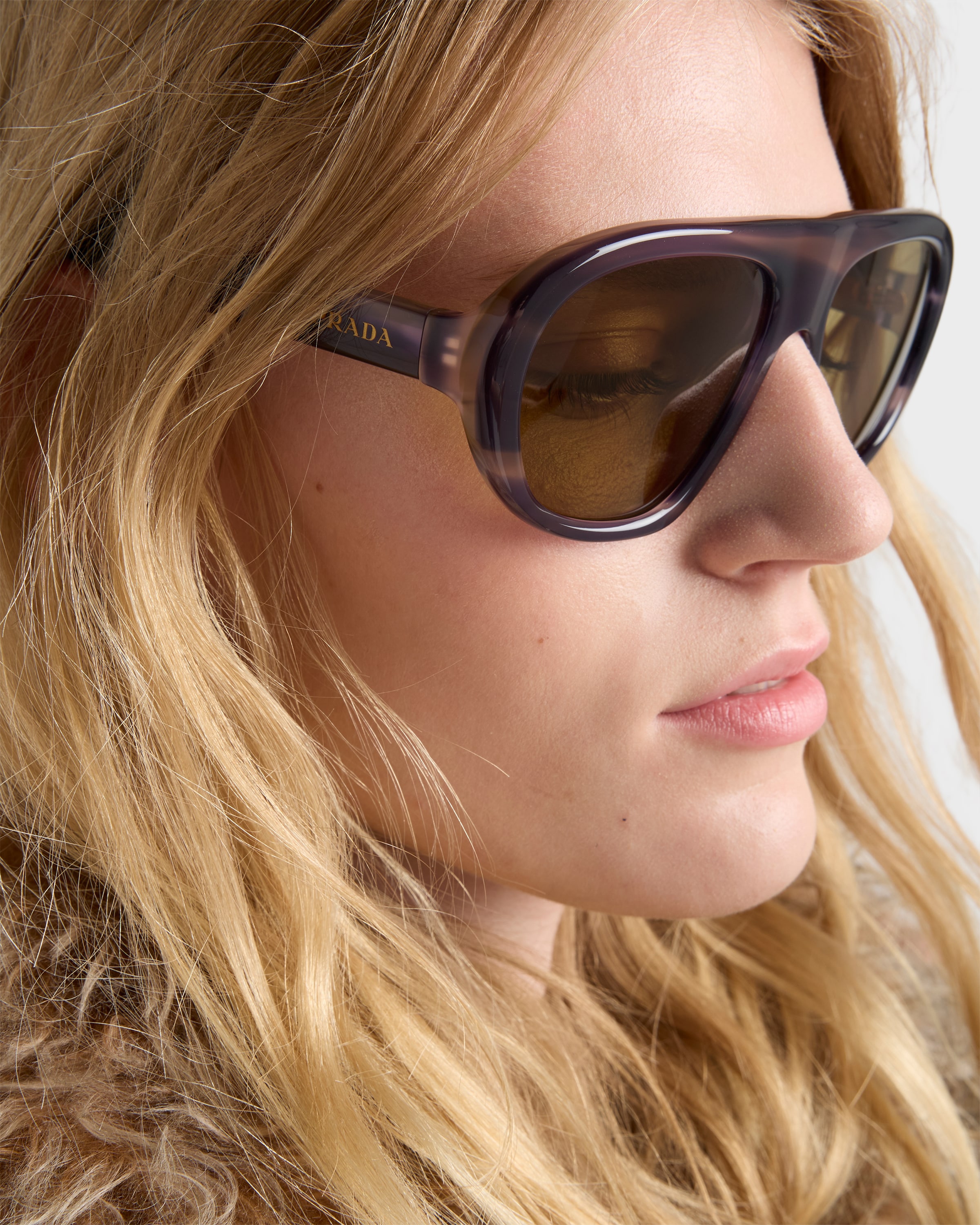 Olive green lenses Prada Eyewear Collection sunglasses | PRADA