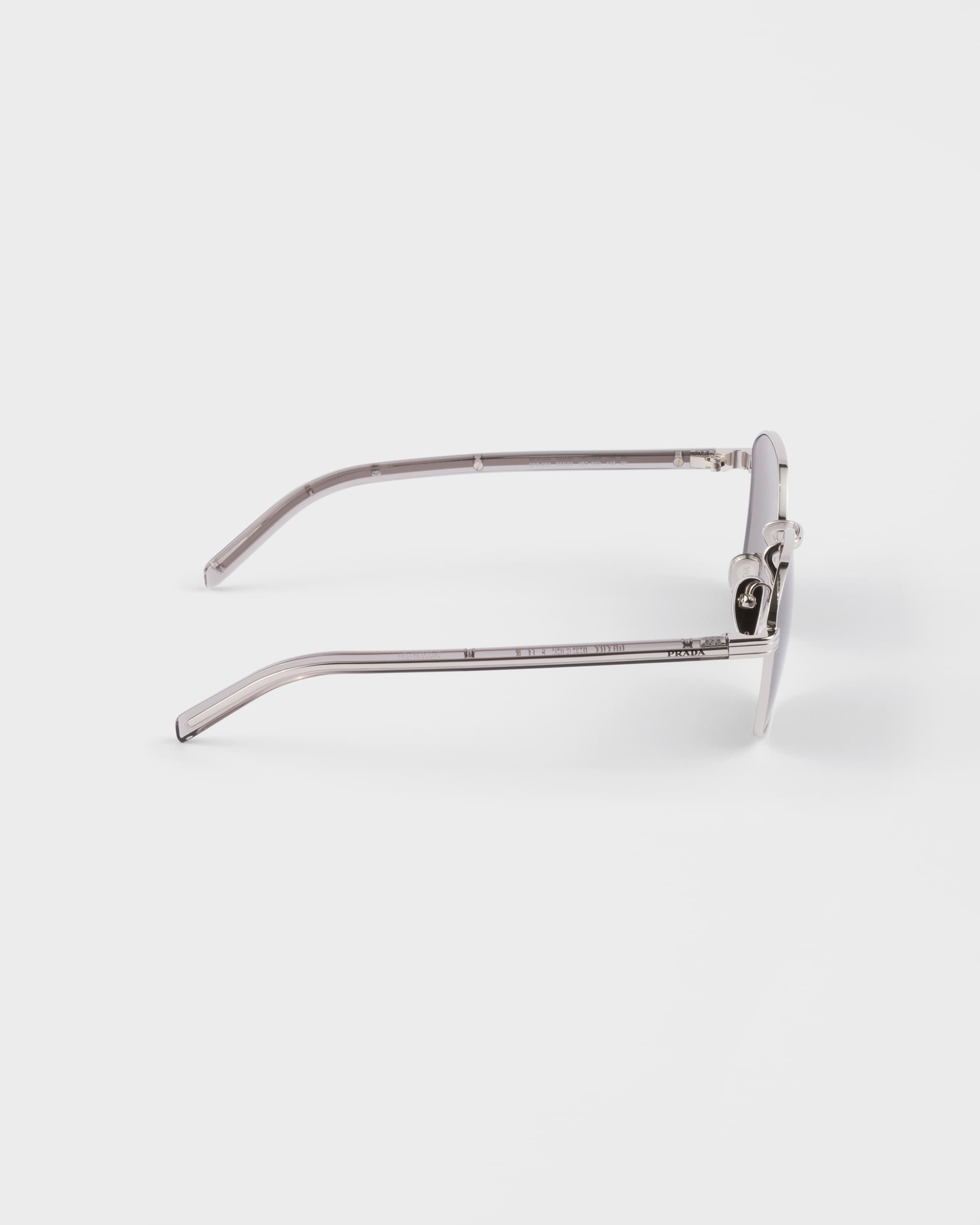Prada Sunglasses With The Iconic Metal Plaque In Gray