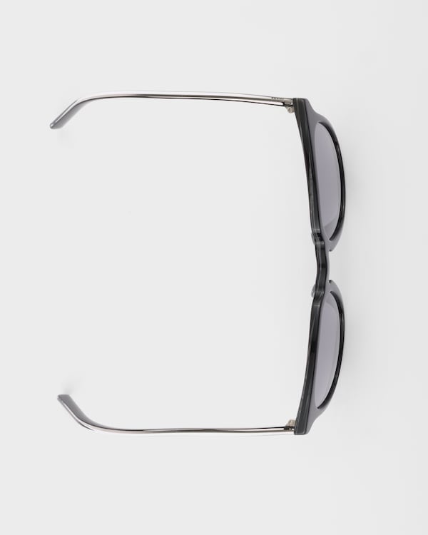 Prada sunglasses with the iconic metal plaque - Polarized black lenses Prada sunglasses with the iconic metal plaque - Polarized black lenses