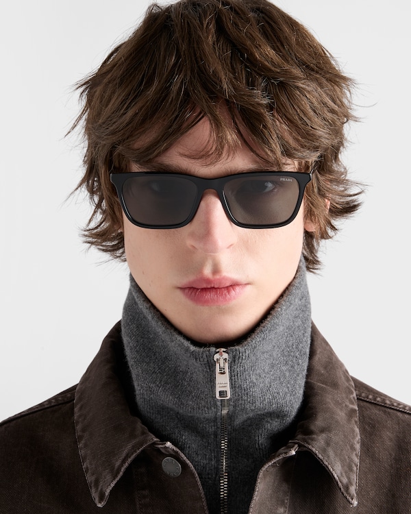Prada sunglasses with the iconic metal plaque - Slate Lenses Prada sunglasses with the iconic metal plaque - Slate Lenses