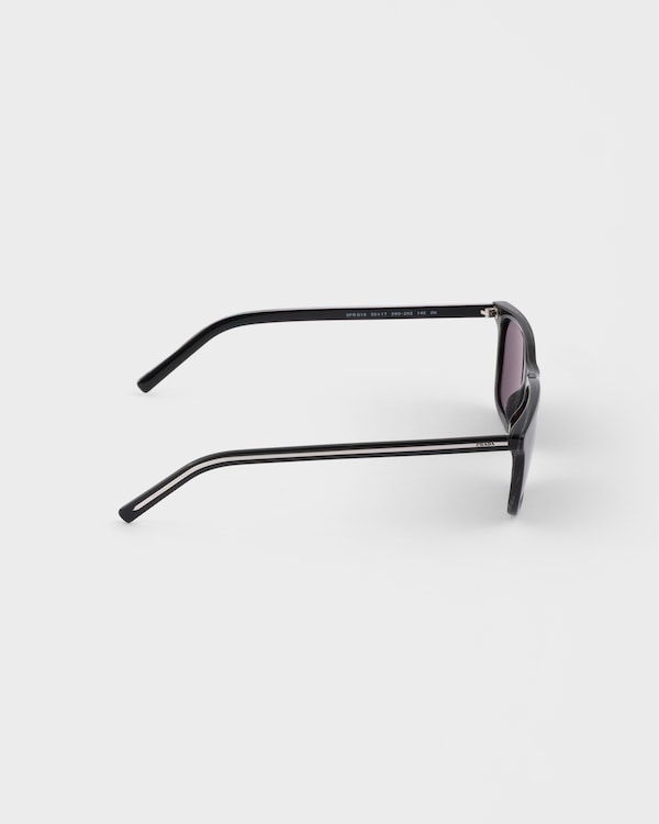 Prada sunglasses with the iconic metal plaque - Slate Lenses Prada sunglasses with the iconic metal plaque - Slate Lenses