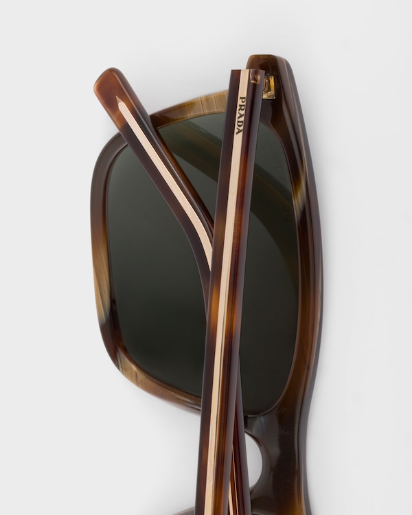 Prada sunglasses with the iconic metal plaque - Polarized bottle green lenses Prada sunglasses with the iconic metal plaque - Polarized bottle green lenses