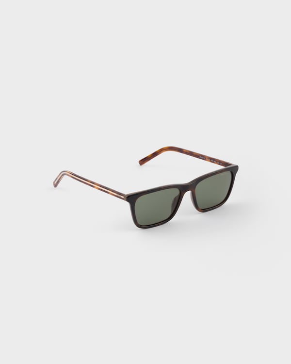 Prada sunglasses with the iconic metal plaque - Polarized bottle green lenses Prada sunglasses with the iconic metal plaque - Polarized bottle green lenses