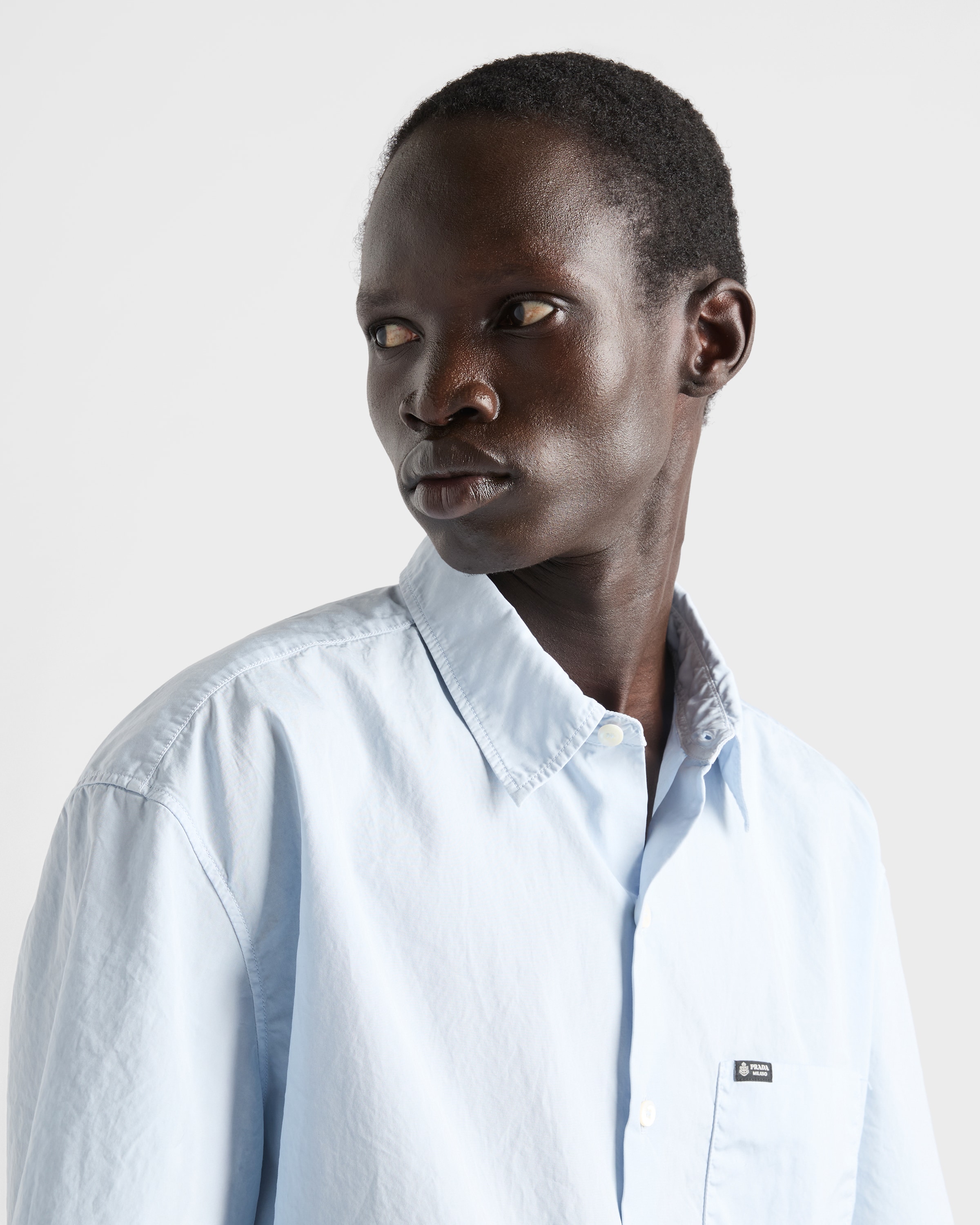 Light Blue Short-sleeved cotton shirt | PRADA - United States