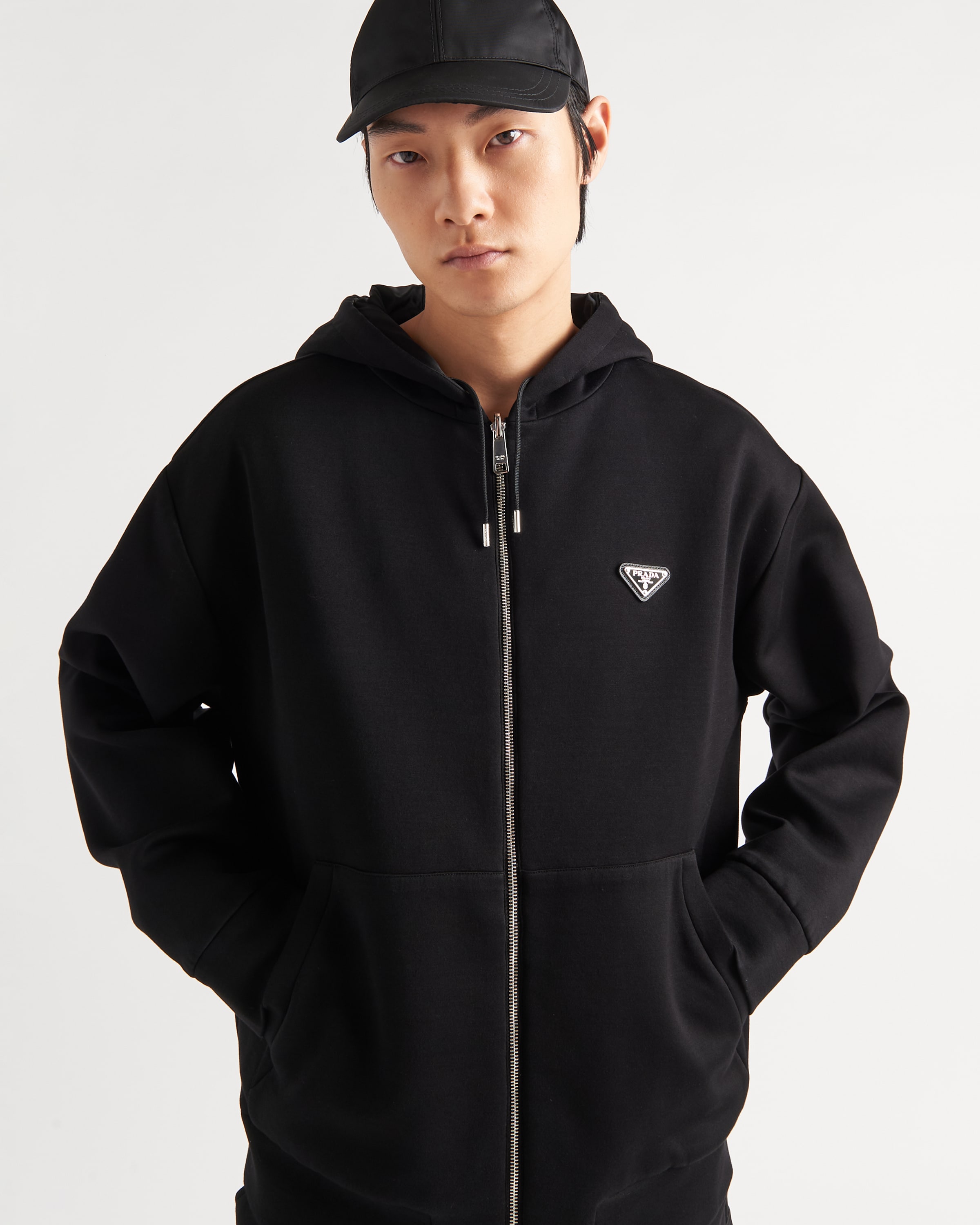 Shop Prada Reversible Cotton Fleece And  Re-nylon Hoodie In Black/black