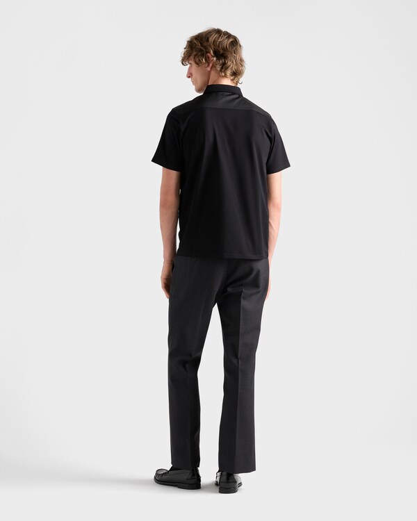 Polo en coton stretch avec détails en Re-Nylon - Noir/Noir Polo en coton stretch avec détails en Re-Nylon - Noir/Noir