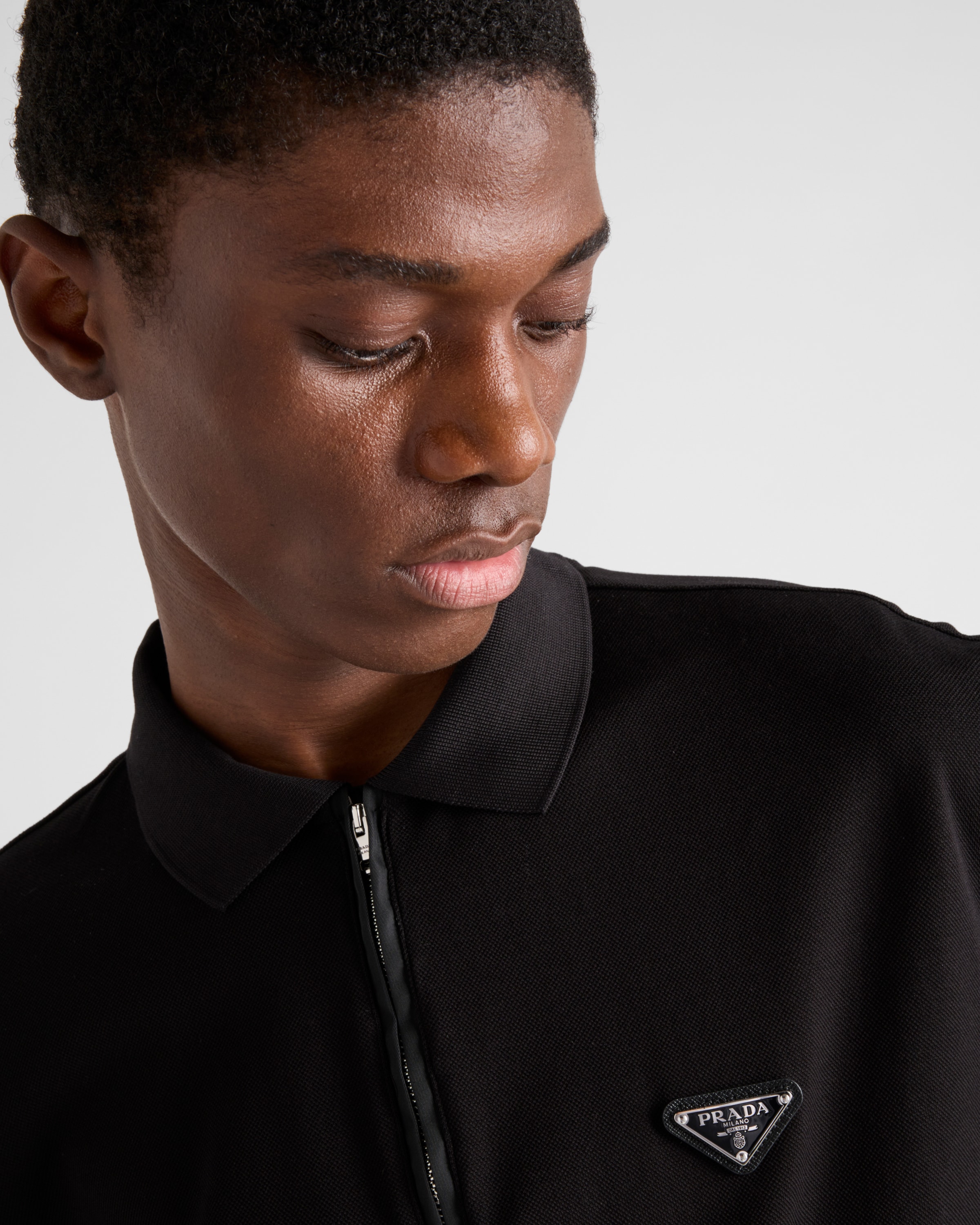 Black Piqué polo shirt with Re-Nylon details | PRADA - United States Black Piqué polo shirt with Re-Nylon details | PRADA - United States