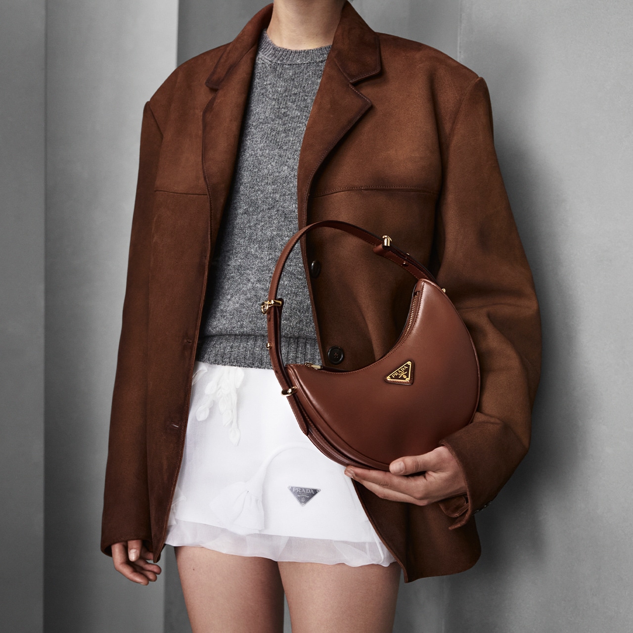 Leather jacket outfit for fall with Prada re edition bag