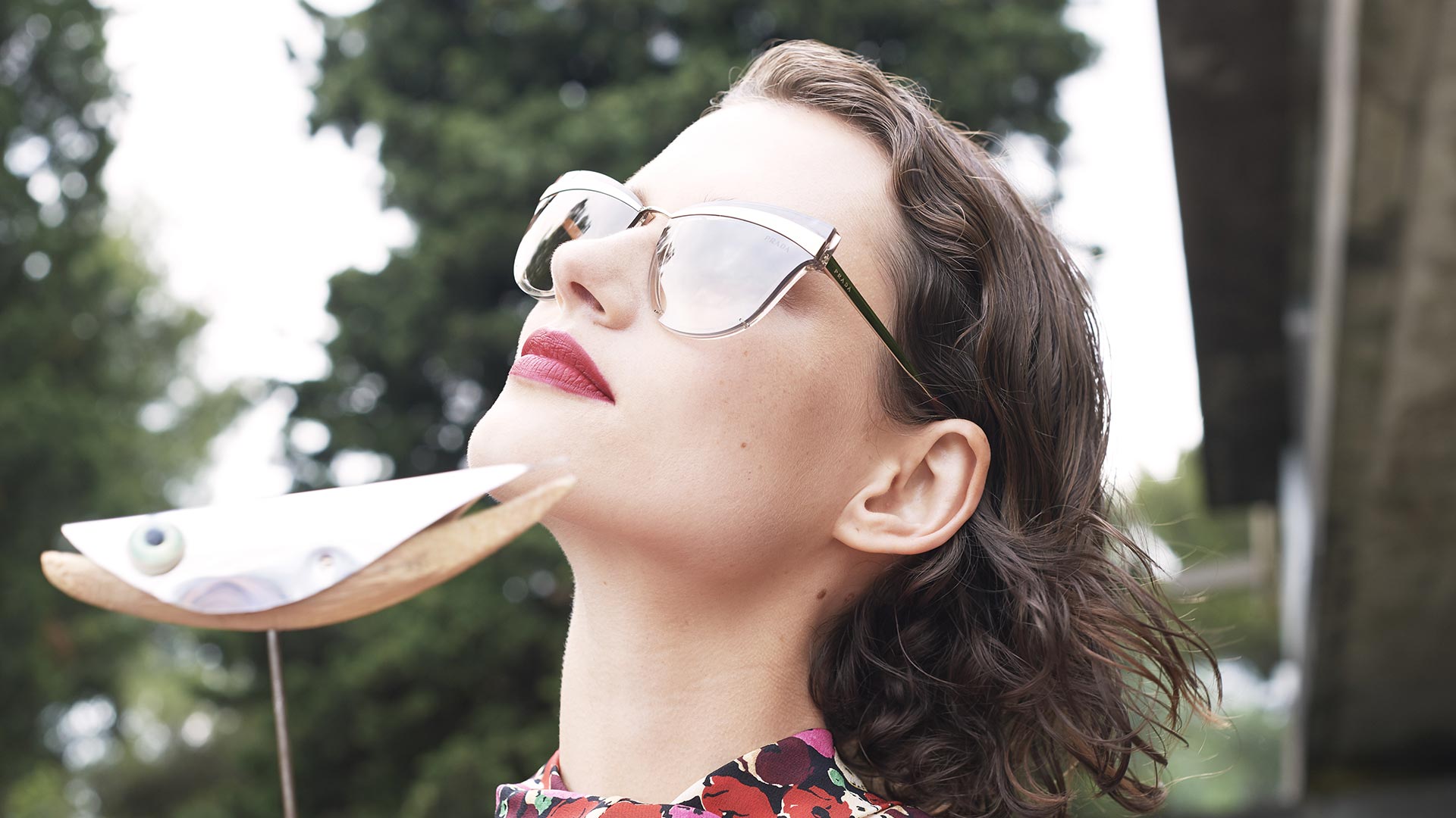 Model wearing Prada sunglasses
