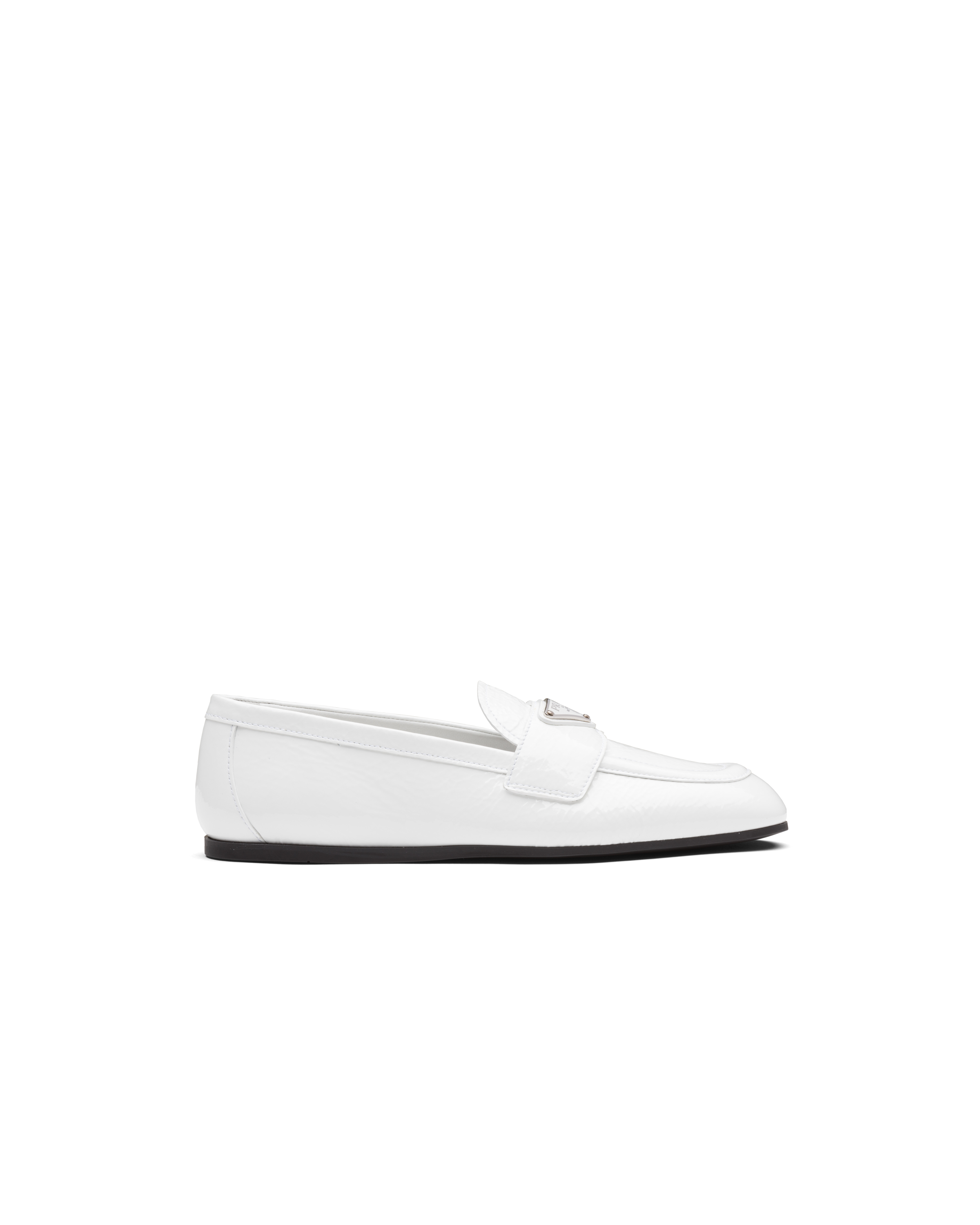 white prada loafers