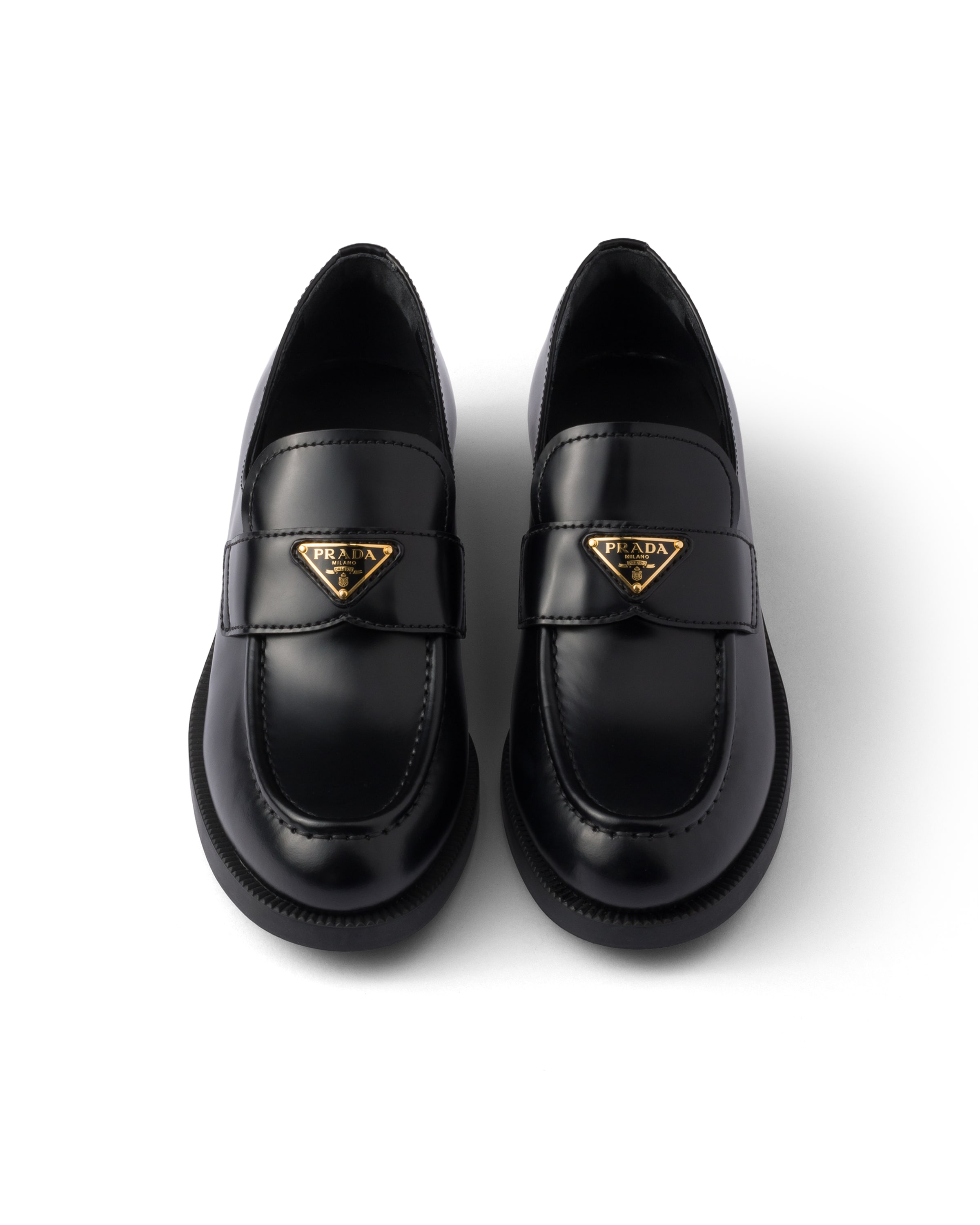 Prada Brushed Leather Loafers In Black