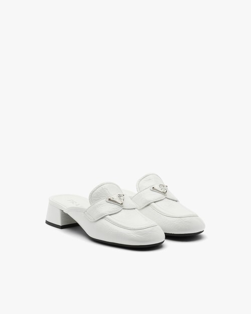prada patent mules with bow