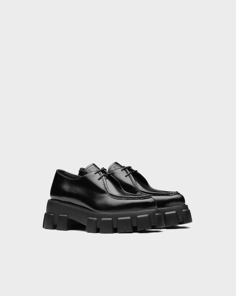 Black Monolith pointy brushed leather lace-up shoes | Prada