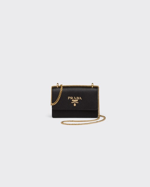 Black Saffiano leather card holder with shoulder strap | Prada