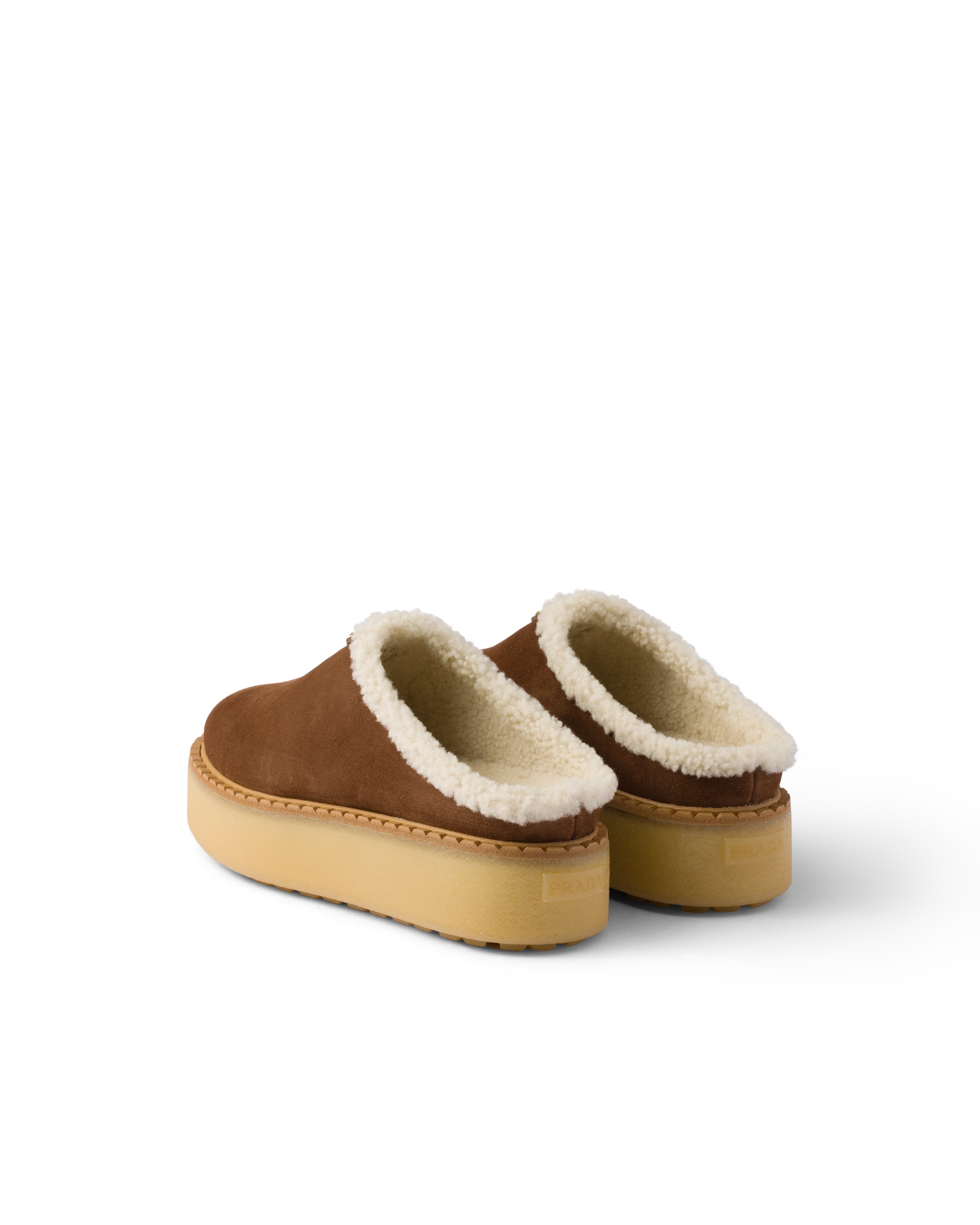 Prada Brown Suede Mules With Shearling Trim And Plush Lining In Blue