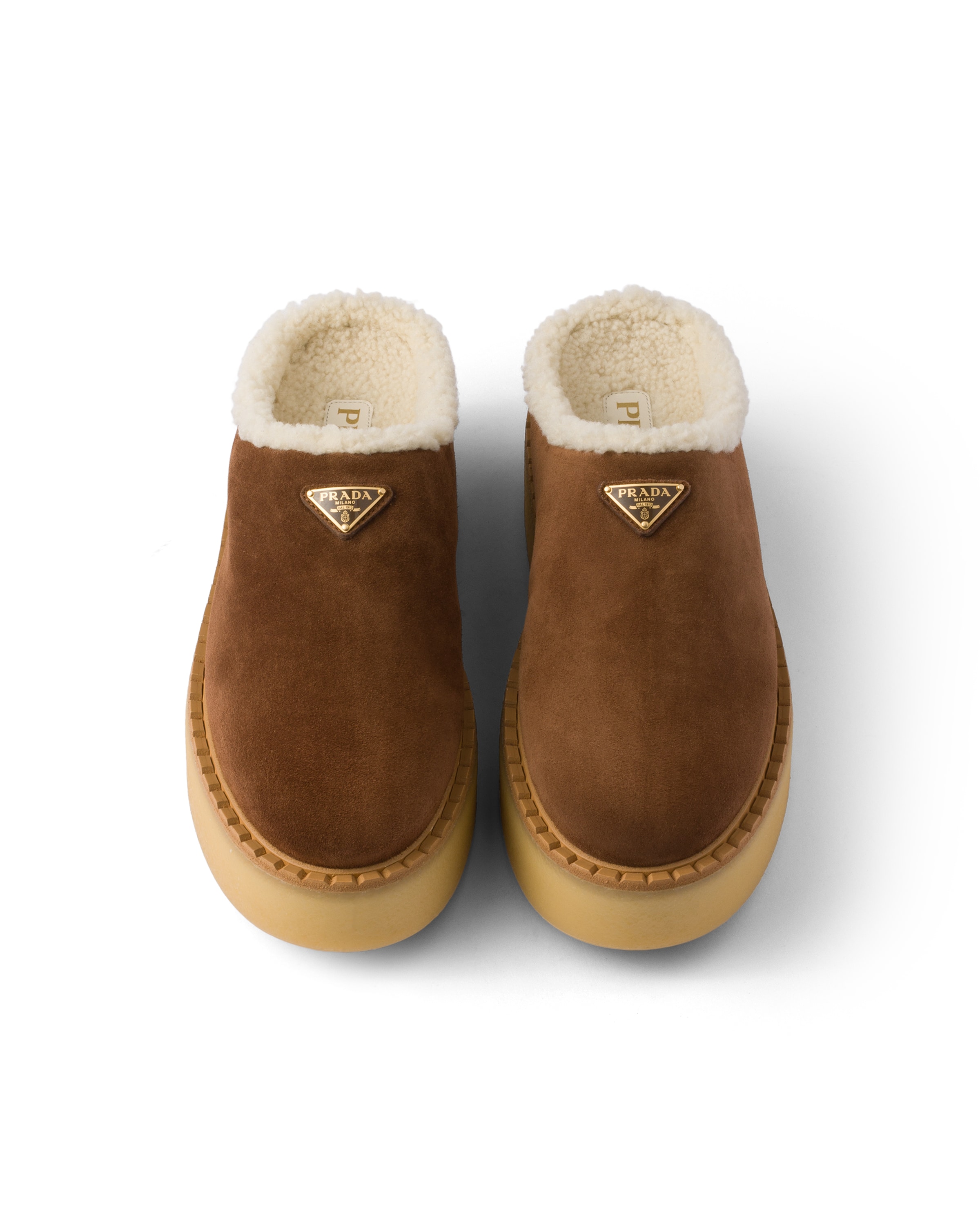 Prada Brown Suede Mules With Shearling Trim And Plush Lining In Blue