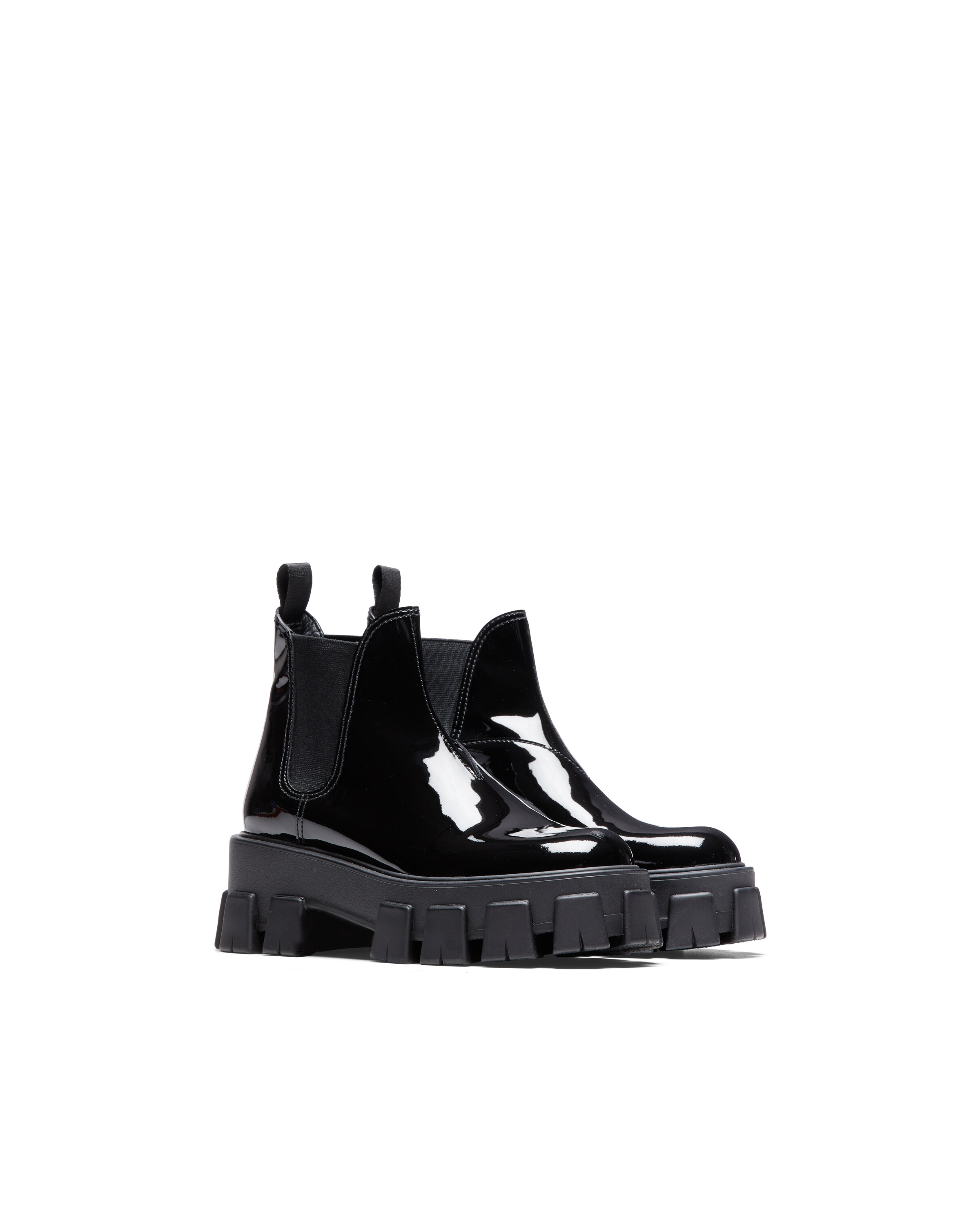 Black Monolith patent leather booties | Prada