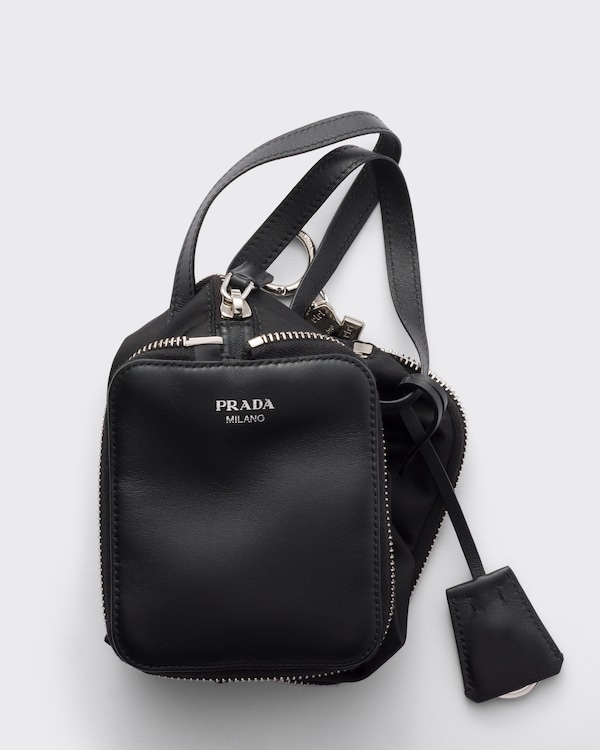 Re-Nylon and leather foldable mini duffel bag - Black Re-Nylon and leather foldable mini duffel bag - Black