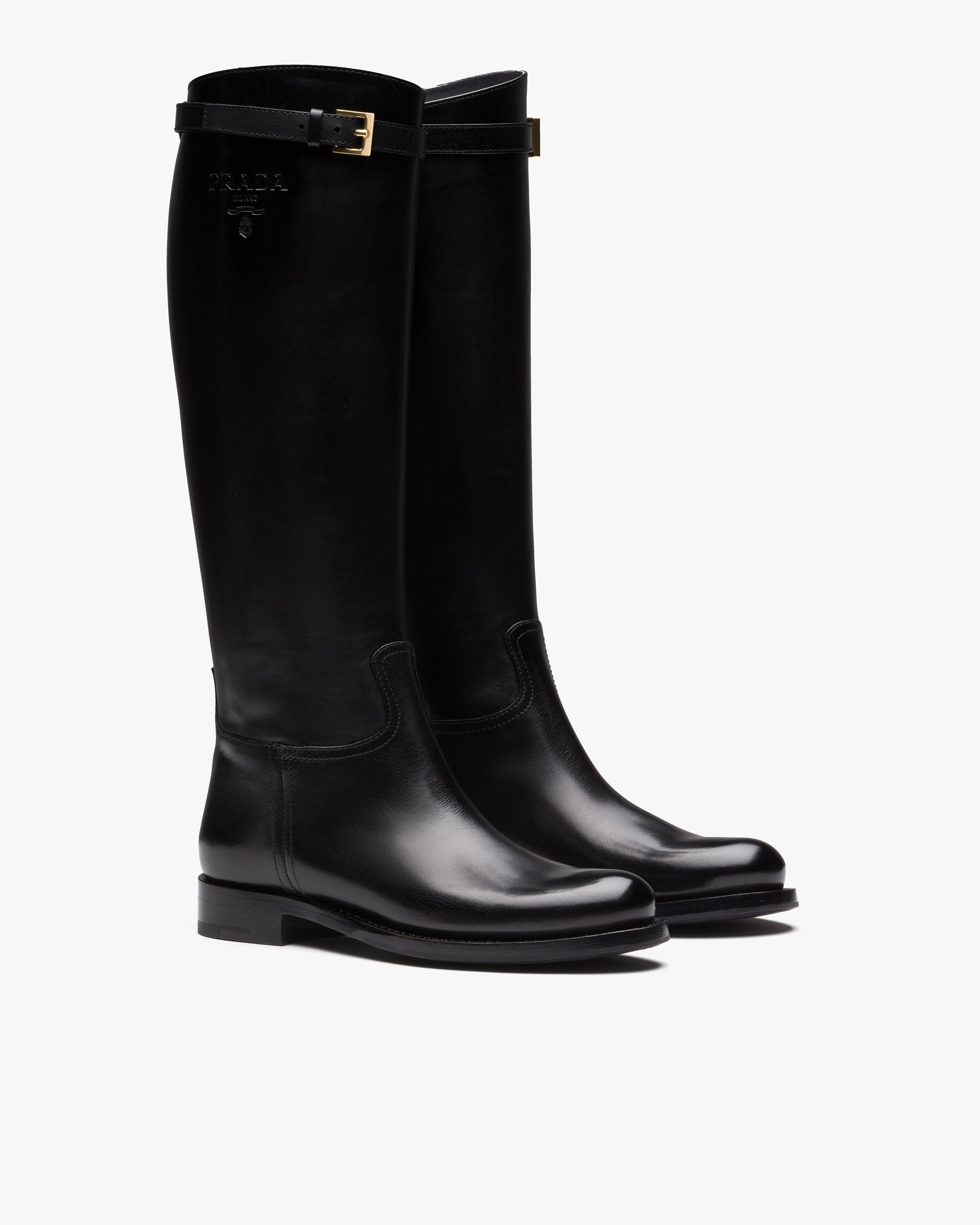 PRADA 25S MARTIN BOOTS IN BLACK CALFSKIN FUR-LINED