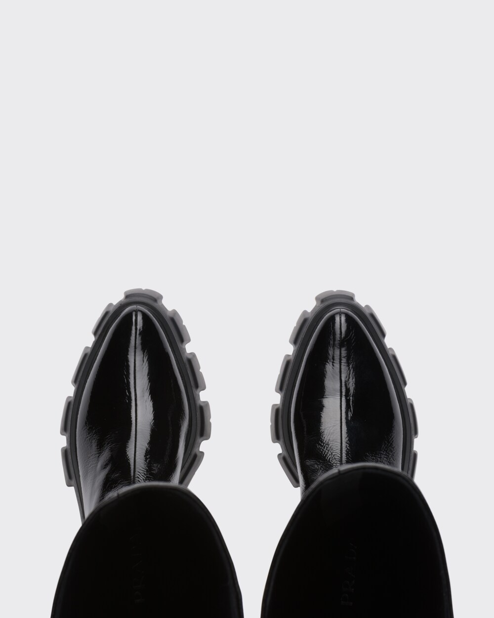 prada monolith patent leather pointed booties