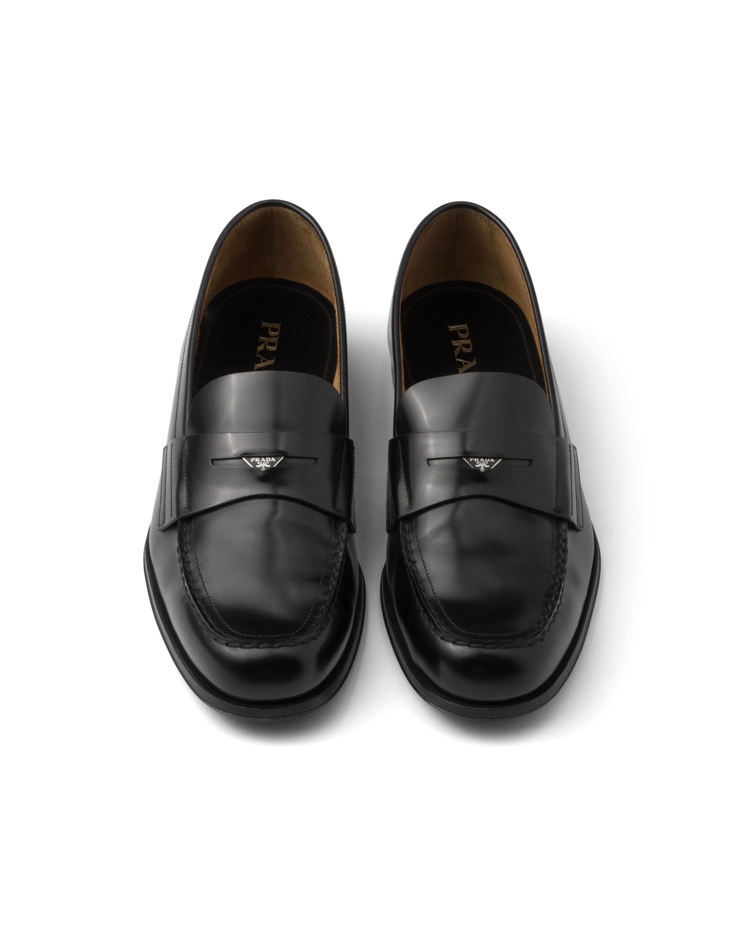 Prada Brushed Leather Loafers In Black