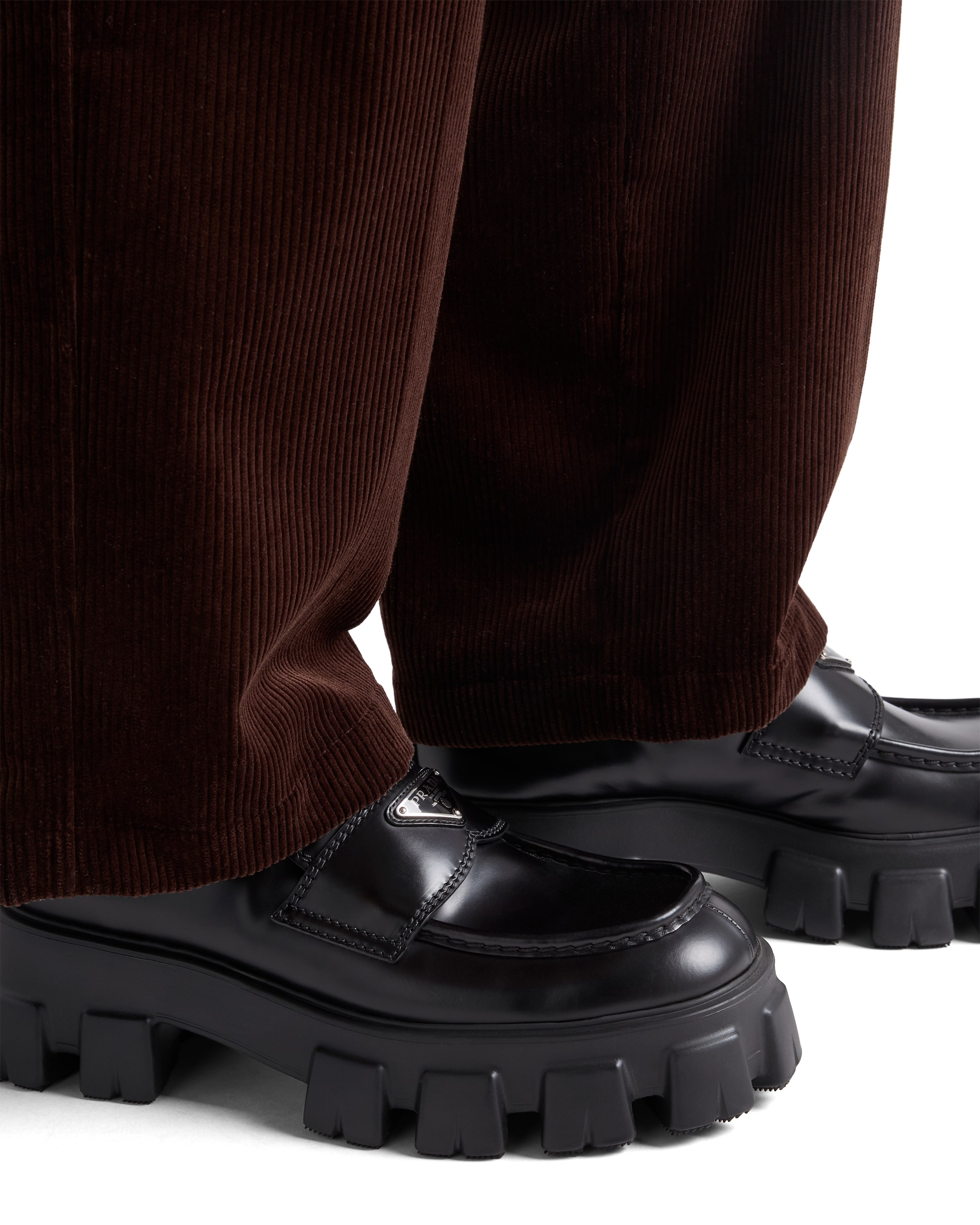 Prada Monolith Logo-plaque Loafers In Black