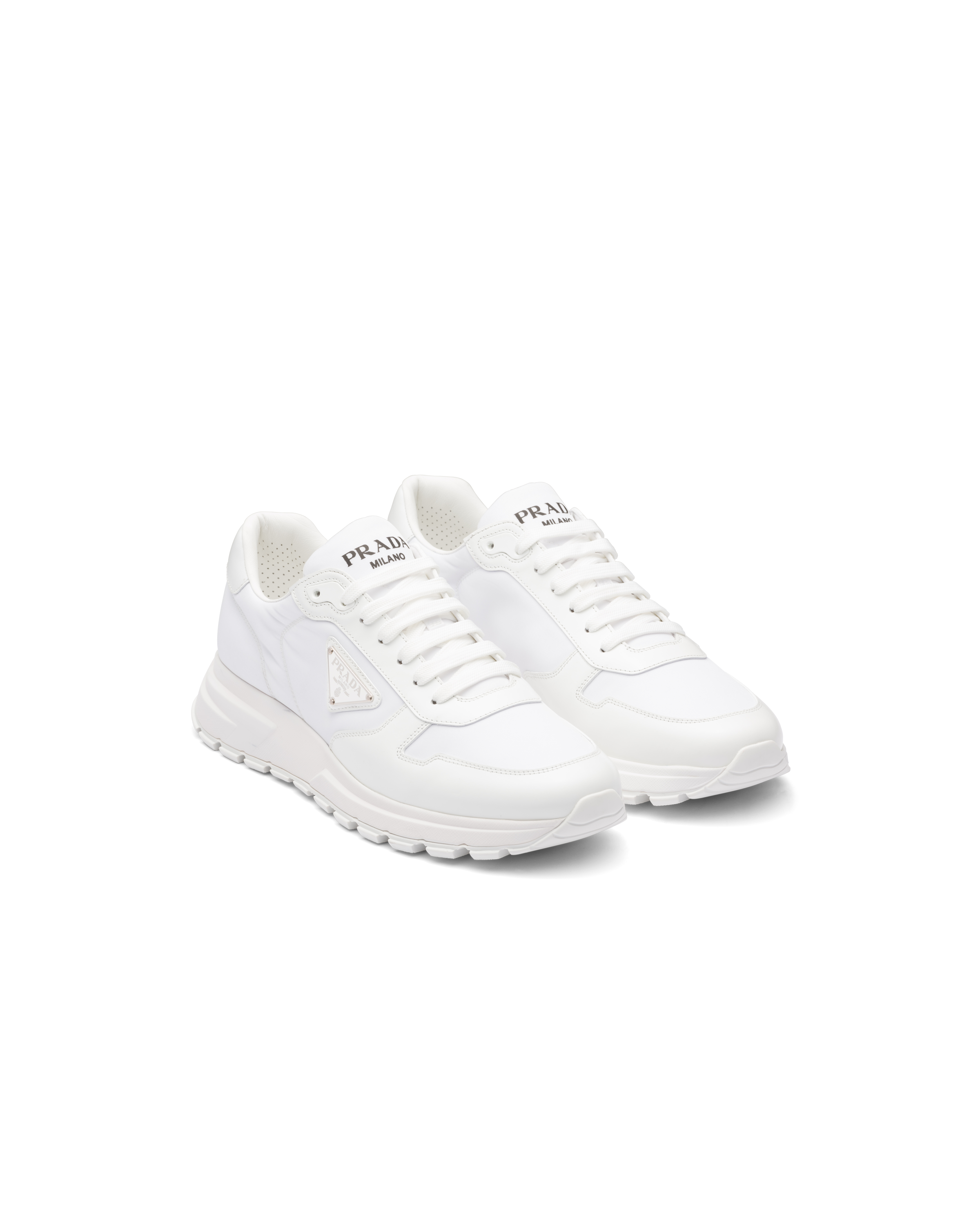 Shop Prada Re-nylon And Brushed Leather Sneakers In White